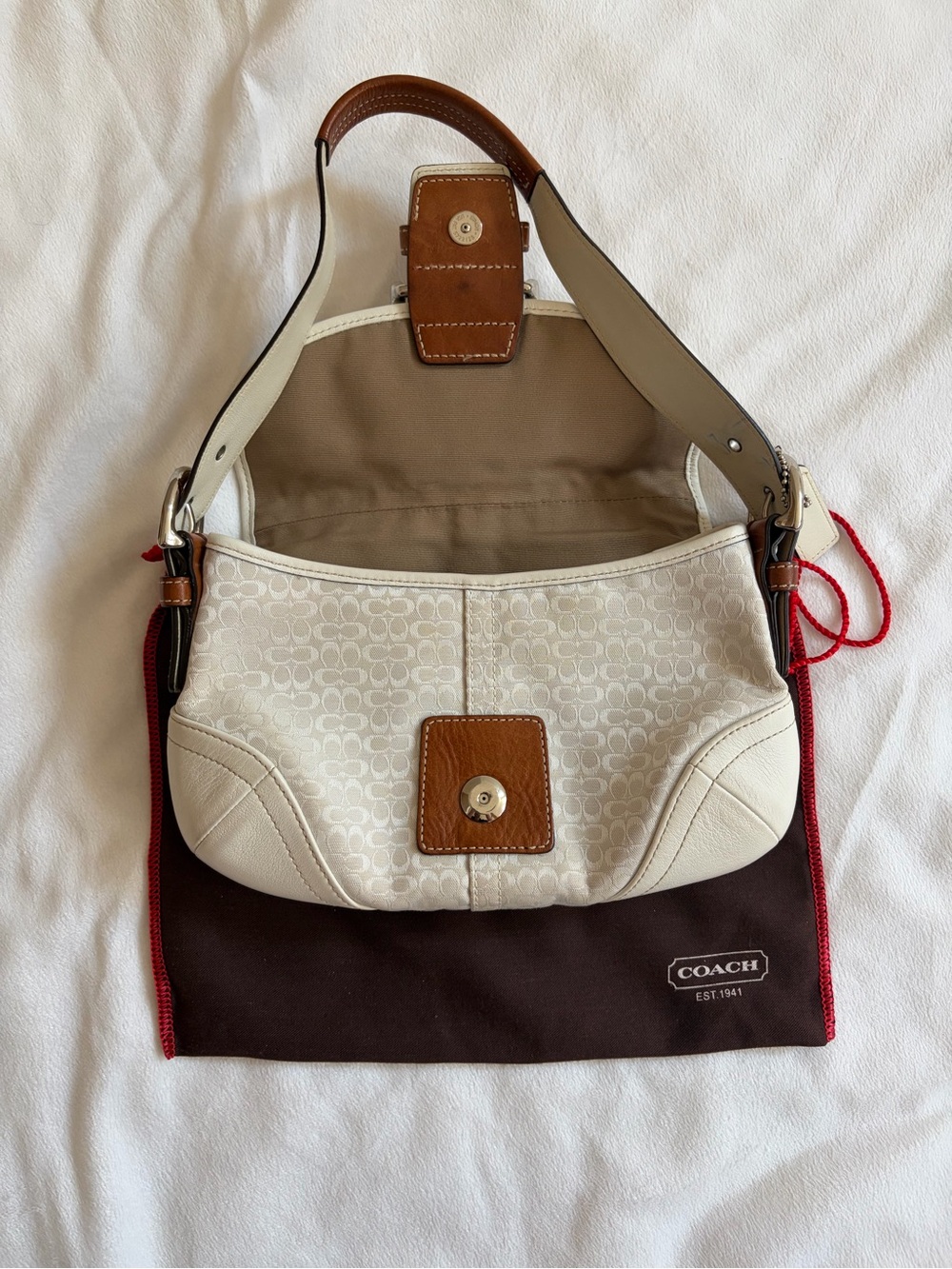 Coach Soho Signature Flap Shoulder Bag
Style No. 6818 - Picture 3 of 13